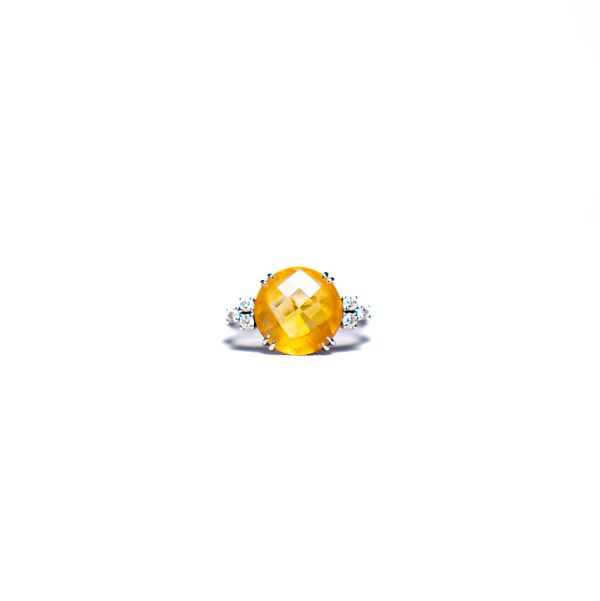 Anello in oro bianco con topazio e diamanti